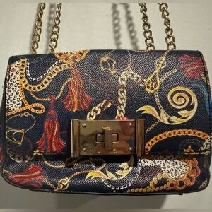 Aldo shoulder bag clutch faux leather chain print black gold orange convertible